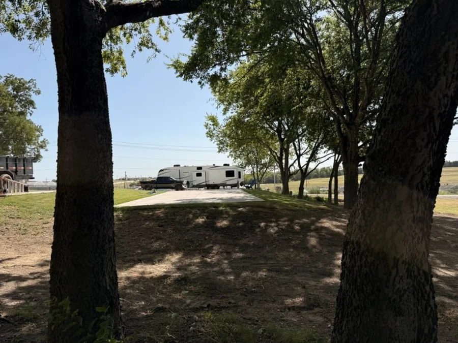An oversized concrete RV pad with full hookups